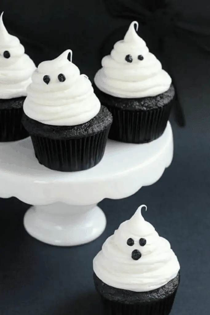 Ghost Cupcakes decorated with vanilla buttercream frosting for Halloween
