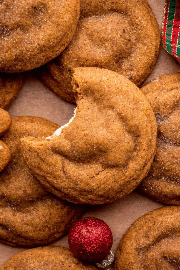 Gingerbread cheesecake cookies with creamy filling and spiced sugar coating