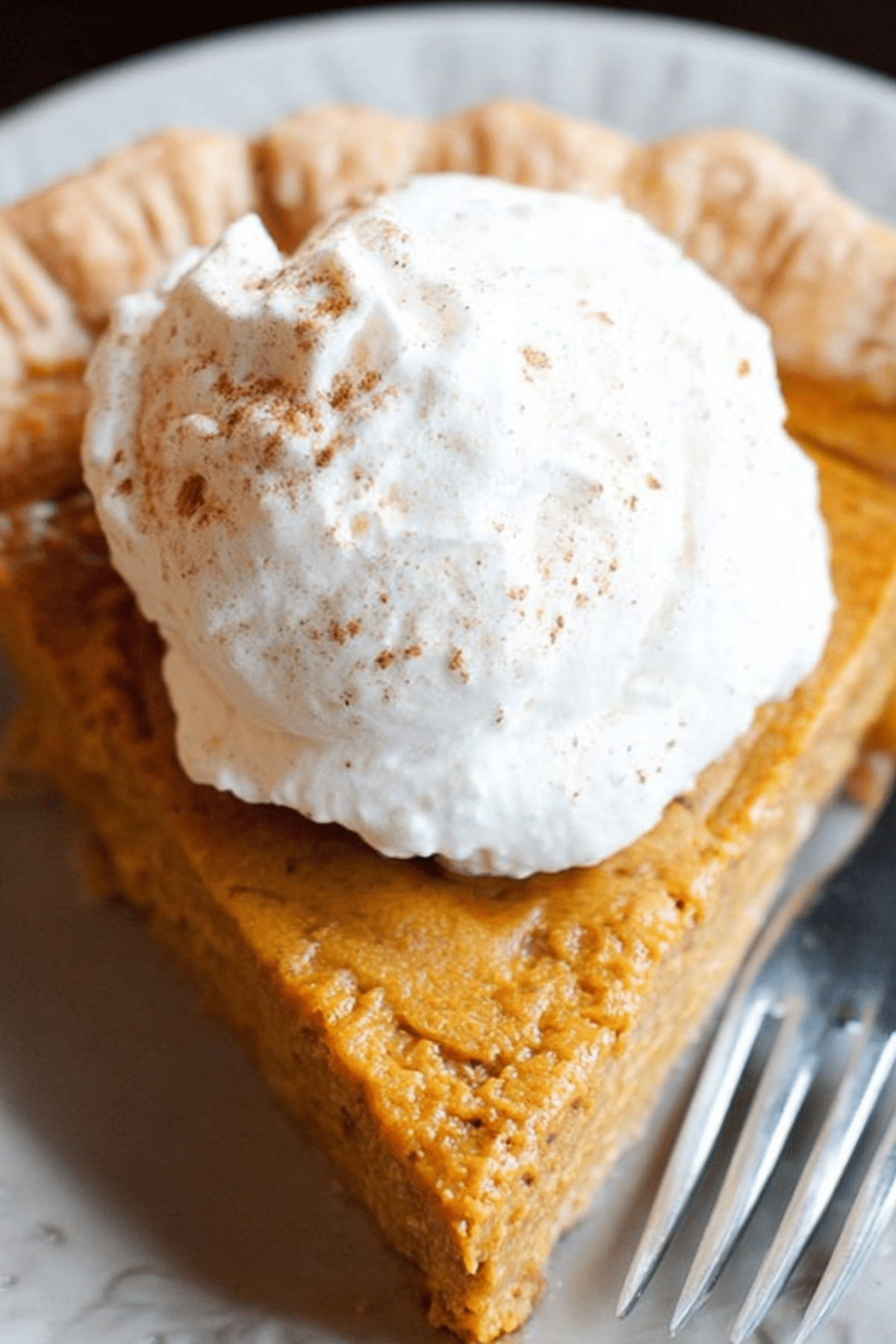 Healthy Pumpkin Pie with creamy filling and spiced crust