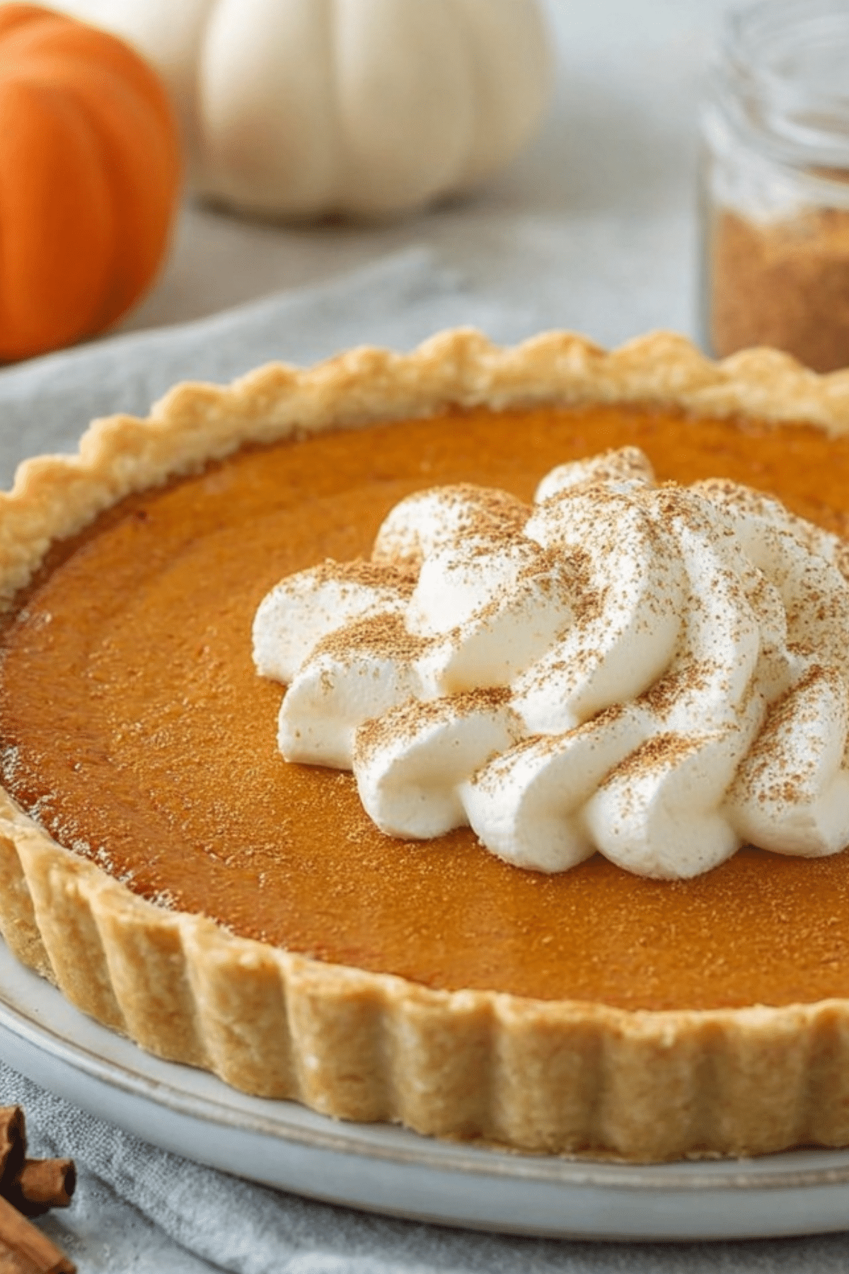 Homemade Fresh Pumpkin Pie served with whipped cream