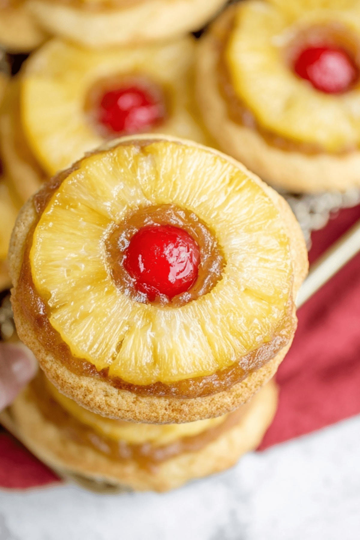 Pineapple Upside Down Sugar Cookies with maraschino cherries and pineapple rings