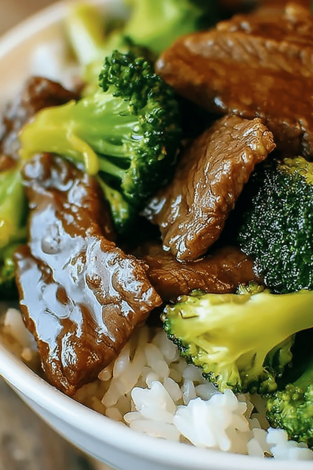 Savory Crock Pot Beef and Broccoli with tender beef and broccoli served over rice