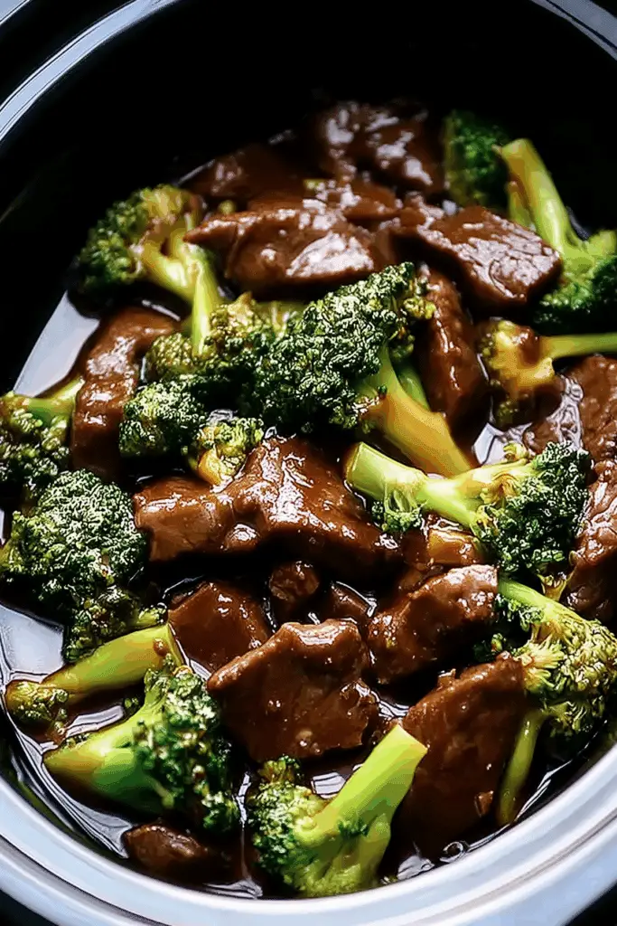 Savory Crock Pot Beef and Broccoli with tender beef and broccoli served over rice