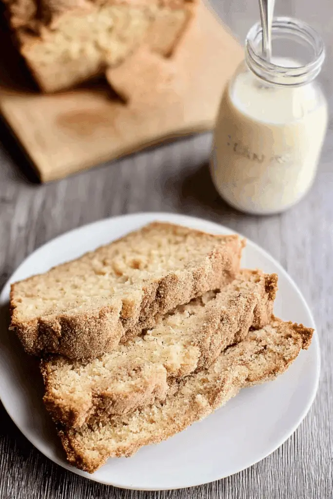 Snickerdoodle Zucchini Bread sliced with cinnamon topping