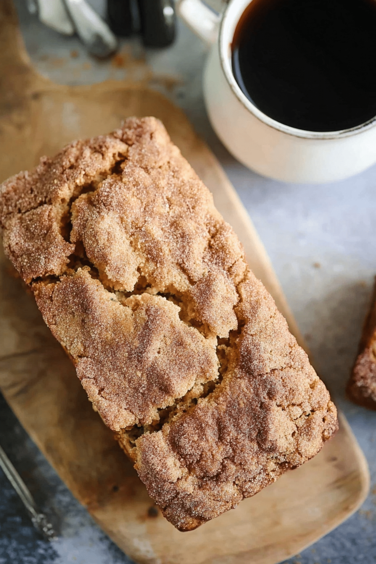 Snickerdoodle Zucchini Bread sliced with cinnamon topping