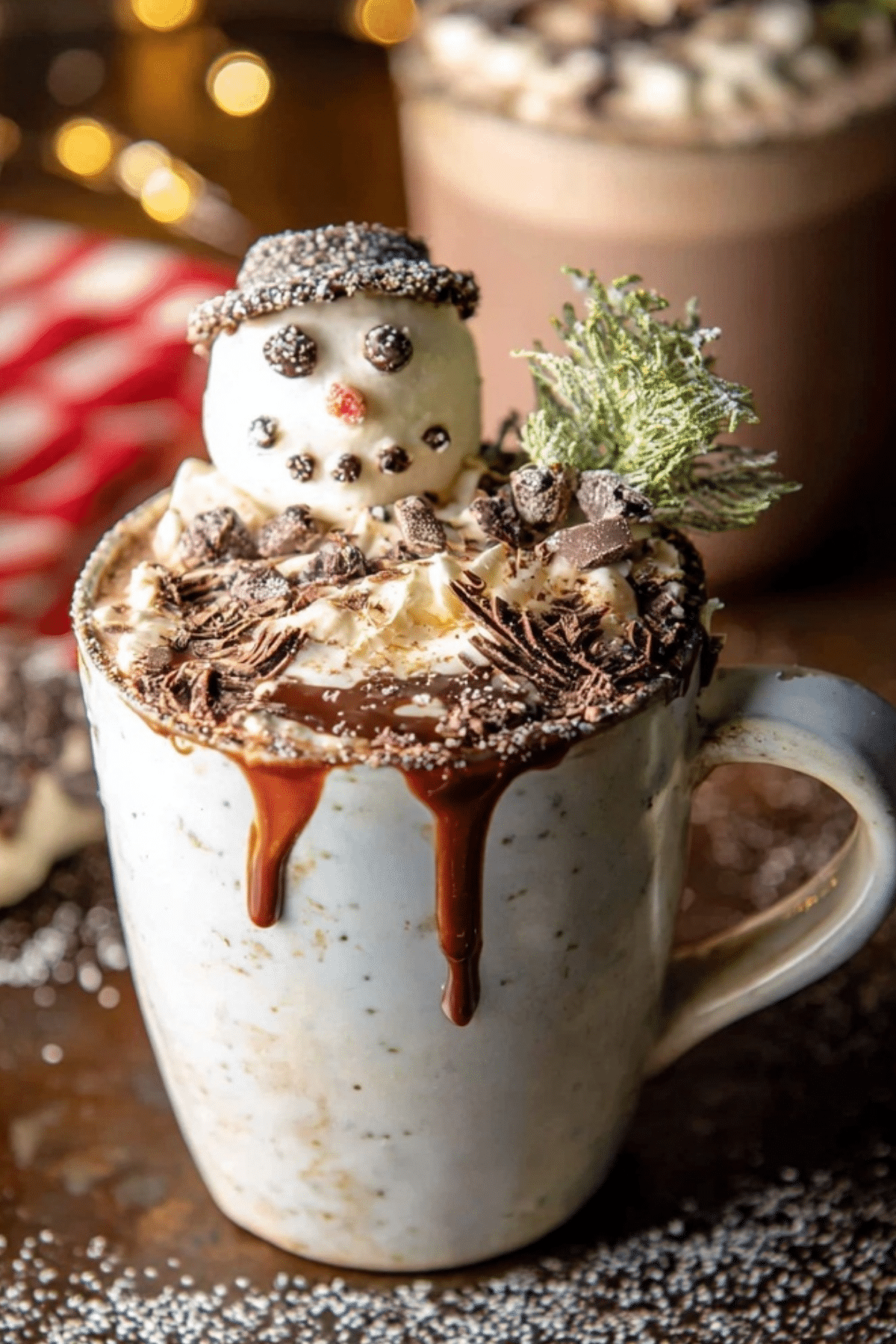 Creamy Caramel Espresso Hot Cocoa topped with whipped cream and marshmallows