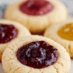 Freshly baked Christmas Thumbprint Cookies with jam centers