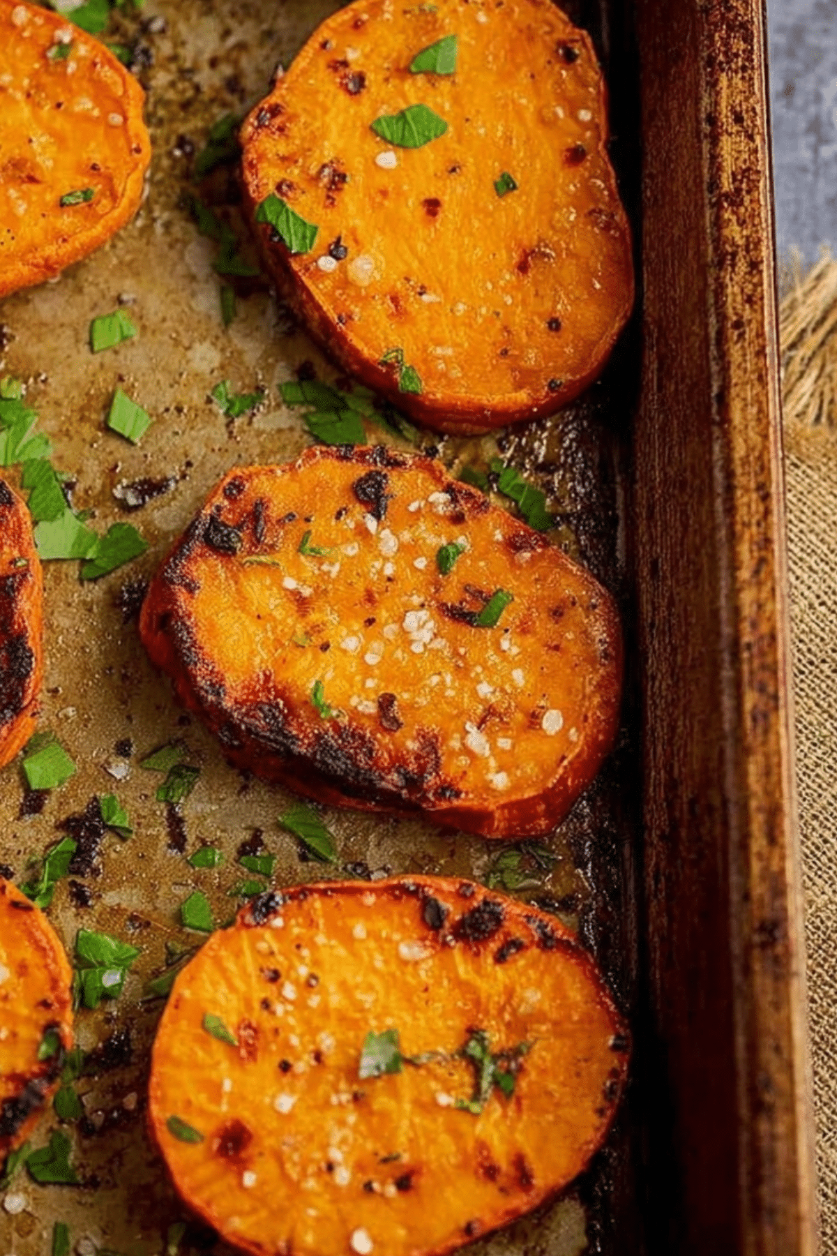 Garlic Butter Roasted Sweet Potatoes on a baking sheet