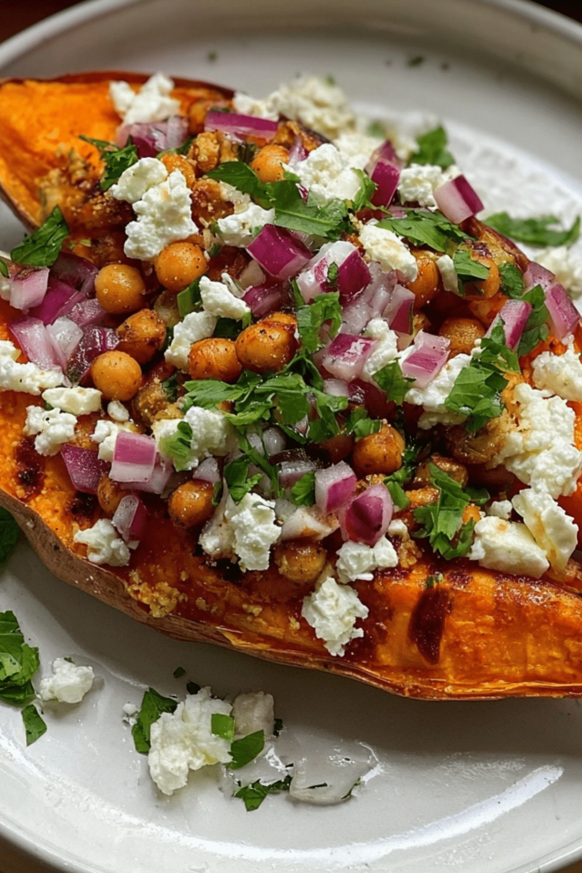 Loaded Roasted Sweet Potato with hummus and crispy chickpeas