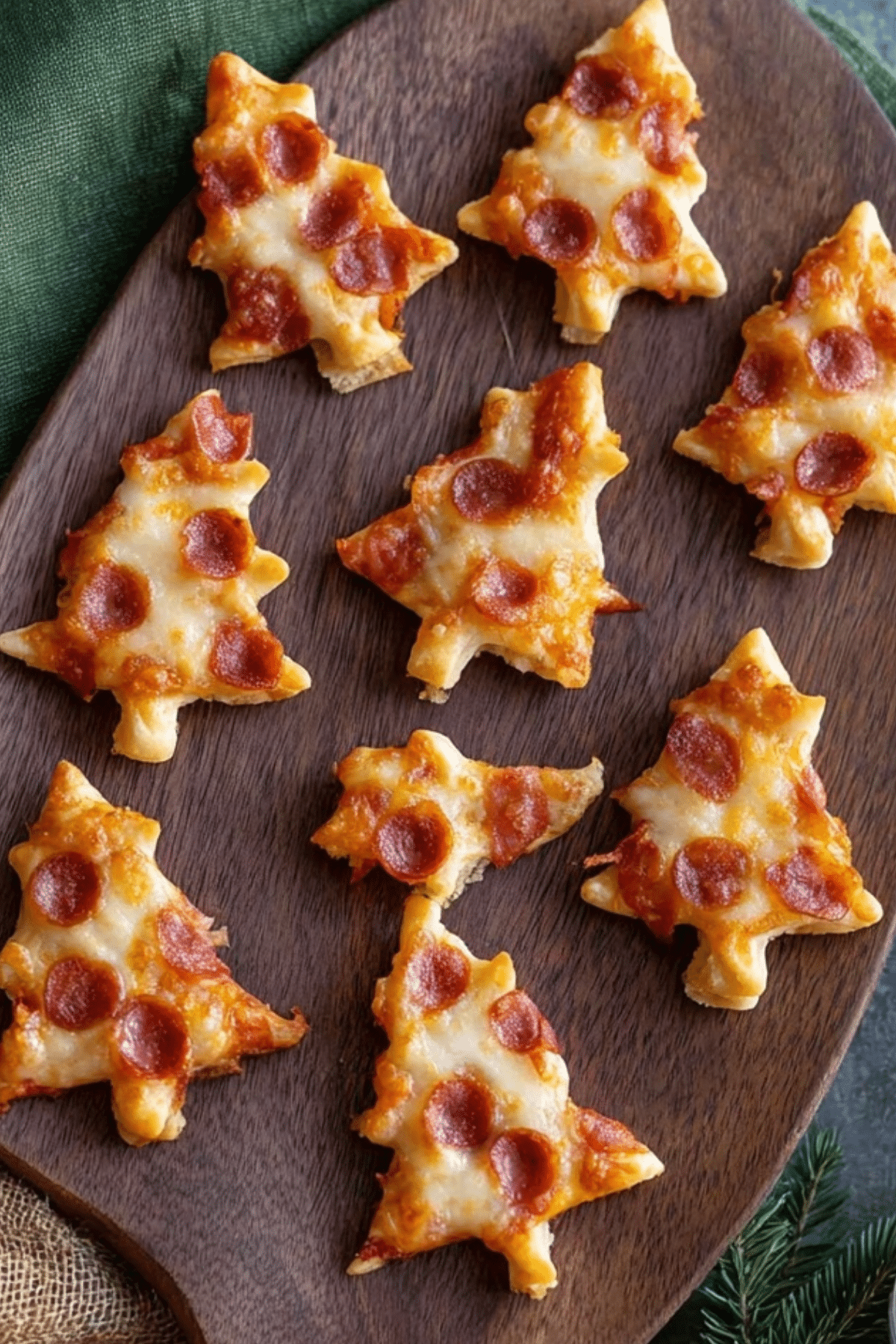 Puff Pastry Christmas Tree Pizza Bites served on a plate