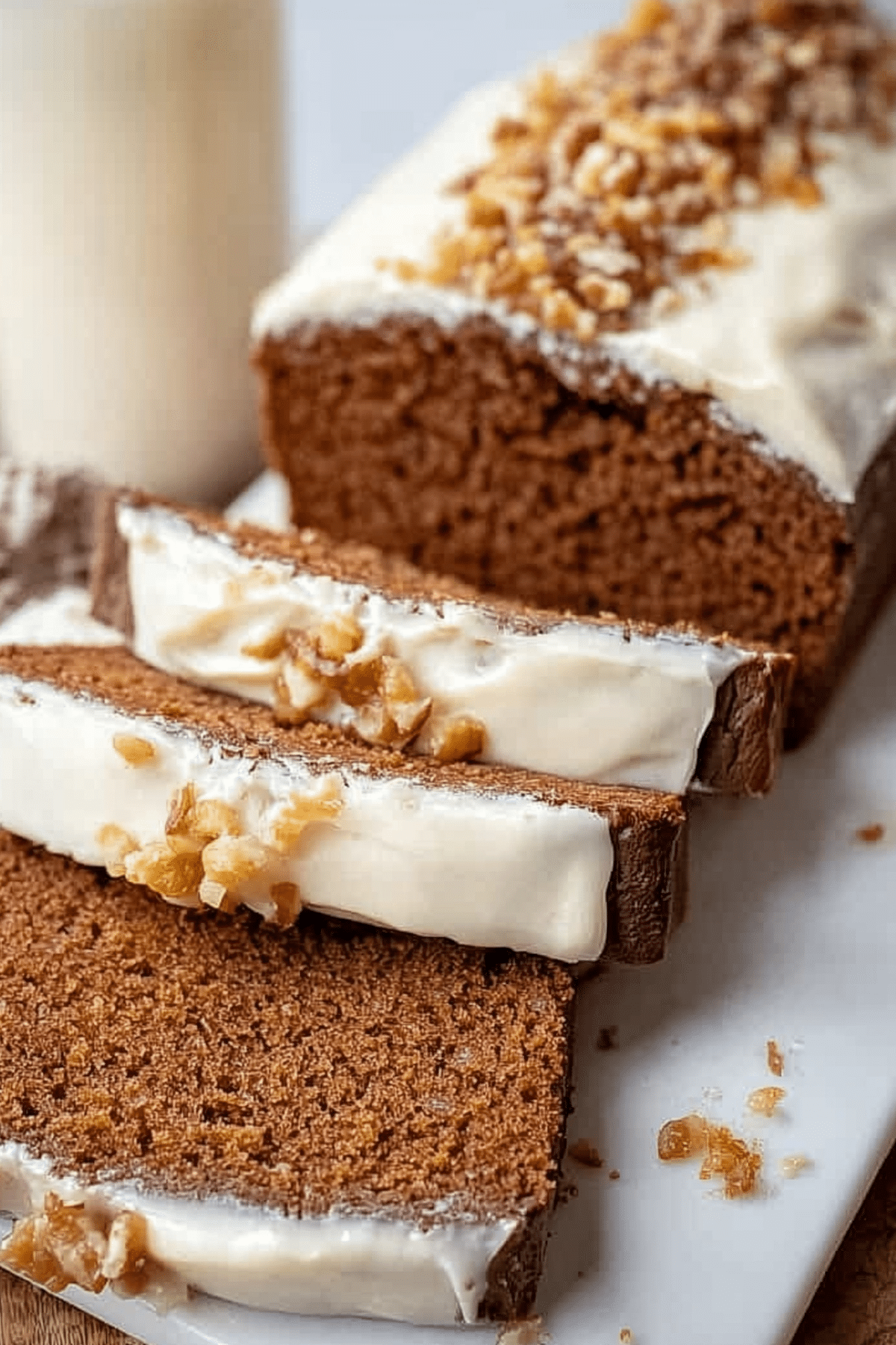 Starbuck’s Gingerbread Loaf with cream cheese frosting on plate