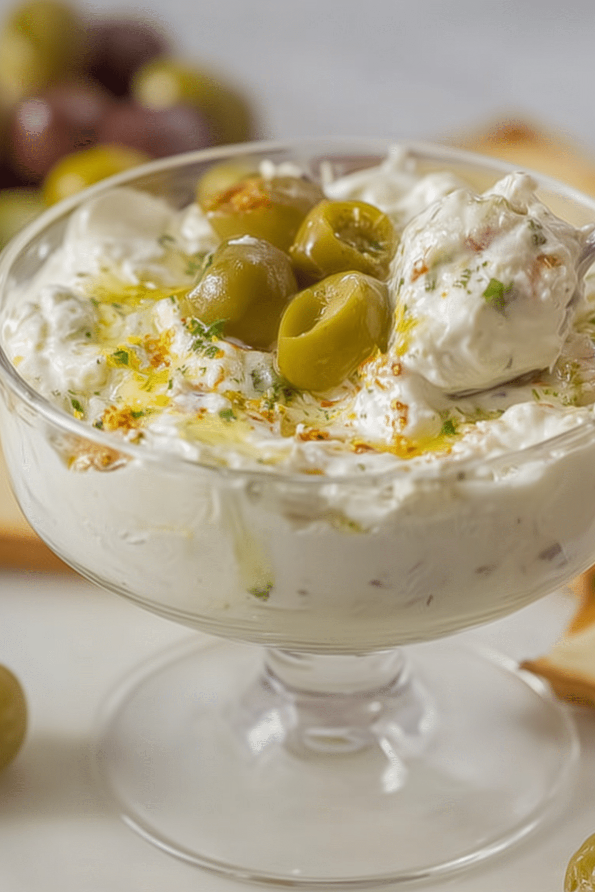 Dirty Martini Dip served with crackers and olives
