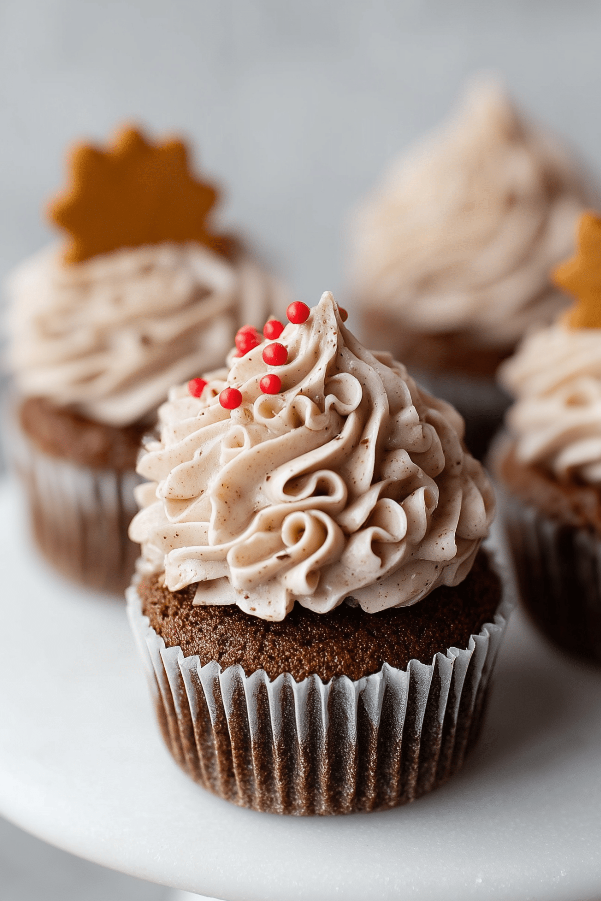 Gingerbread Cupcakes with cinnamon vanilla frosting on top