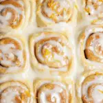 Homemade orange rolls with cream cheese glaze