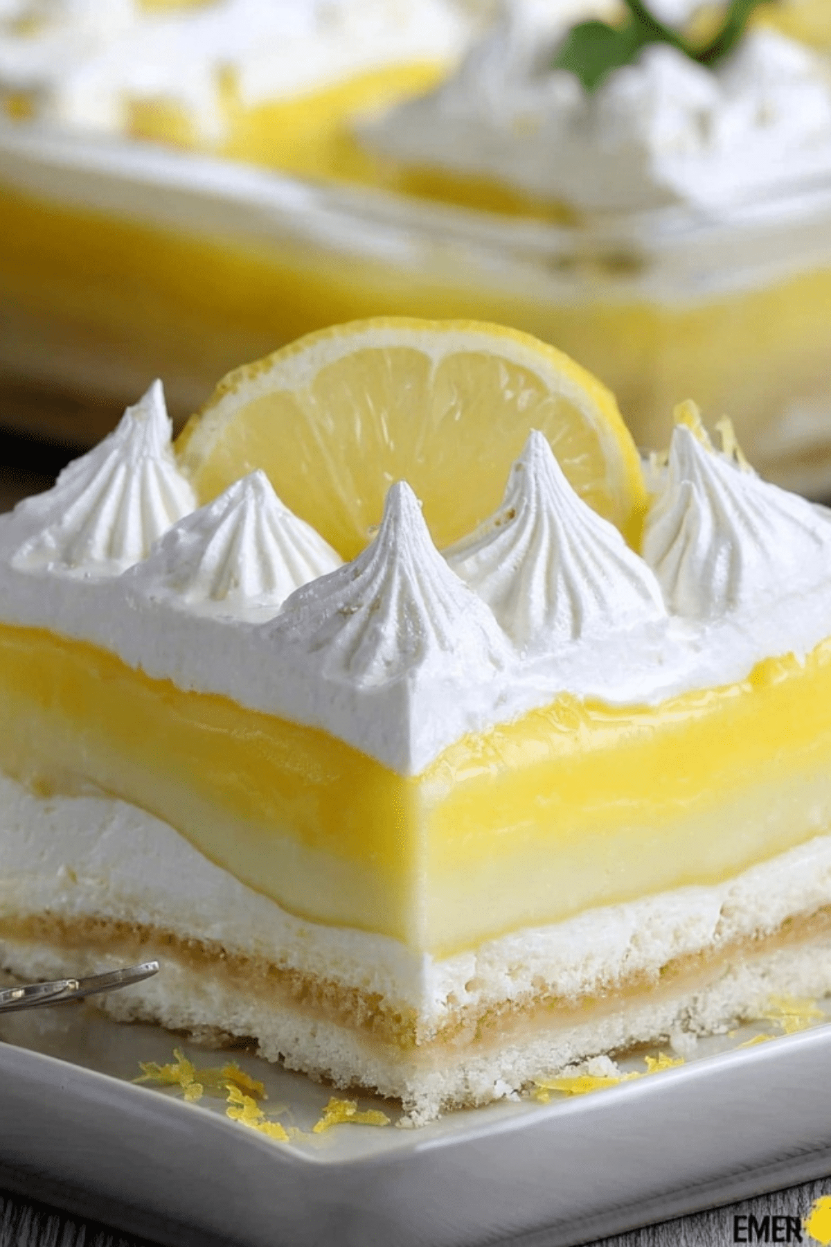 Lemon Lush dessert with creamy layers and lemon topping