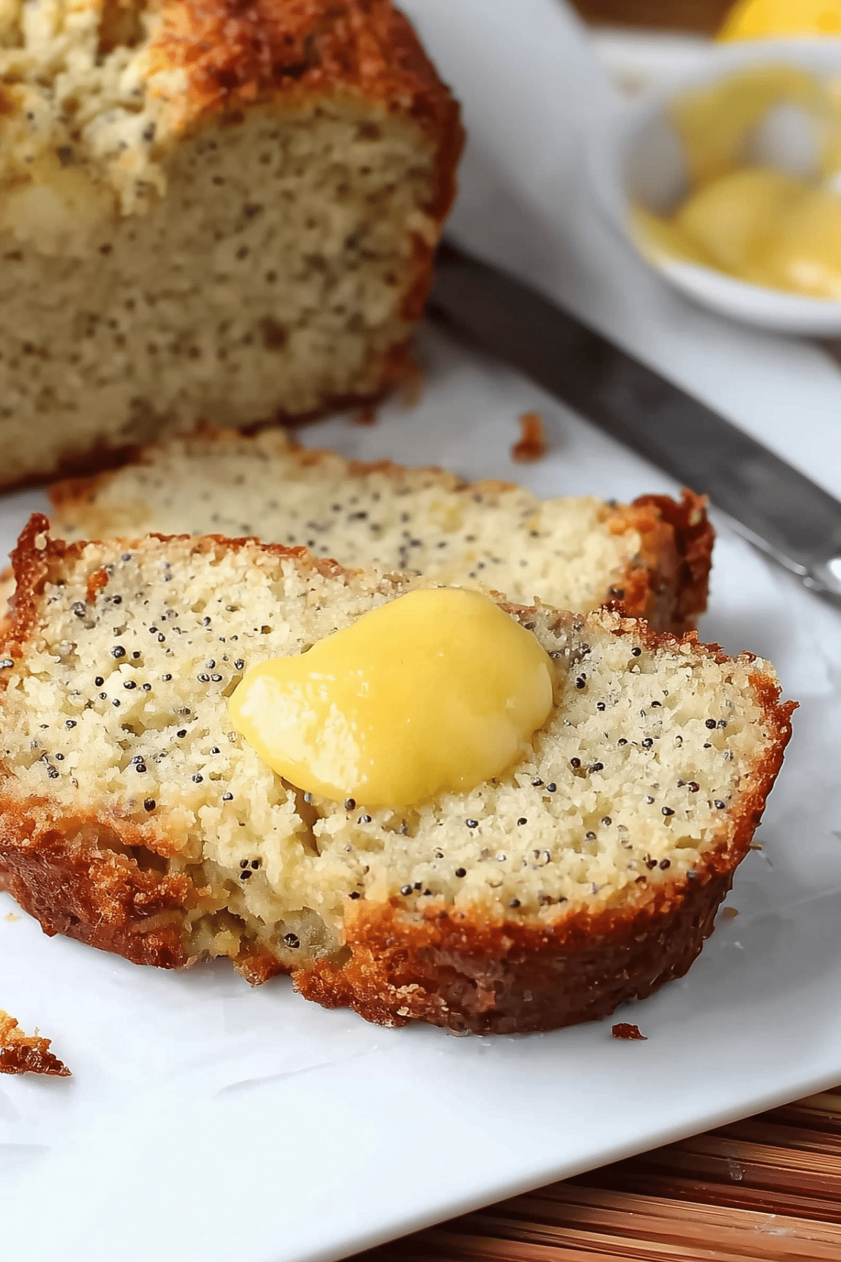 Moist Lemon Poppy Seed Bread with Lemon Curd baked in loaf pan