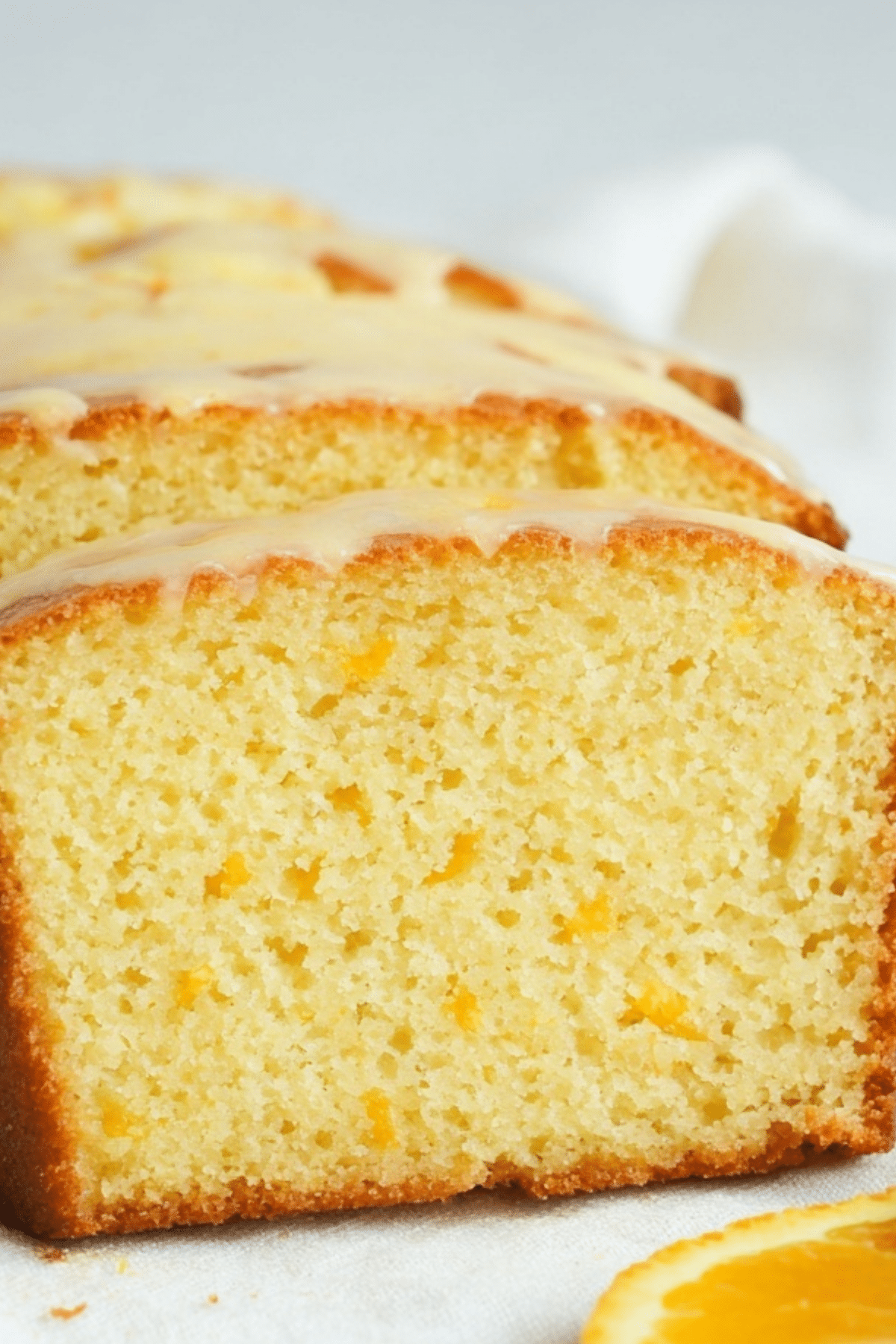 Moist orange loaf with glaze made using fresh orange juice