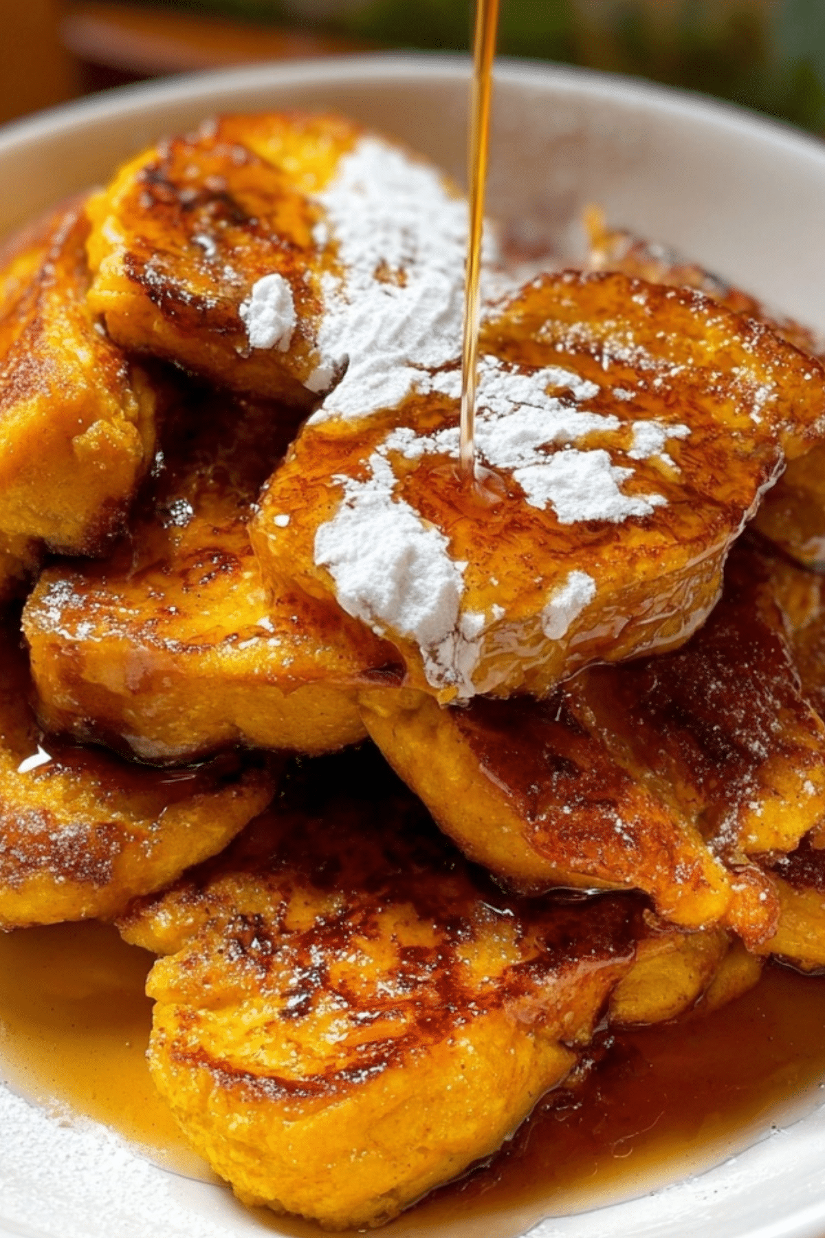 Golden Pumpkin French Toast slices with maple syrup