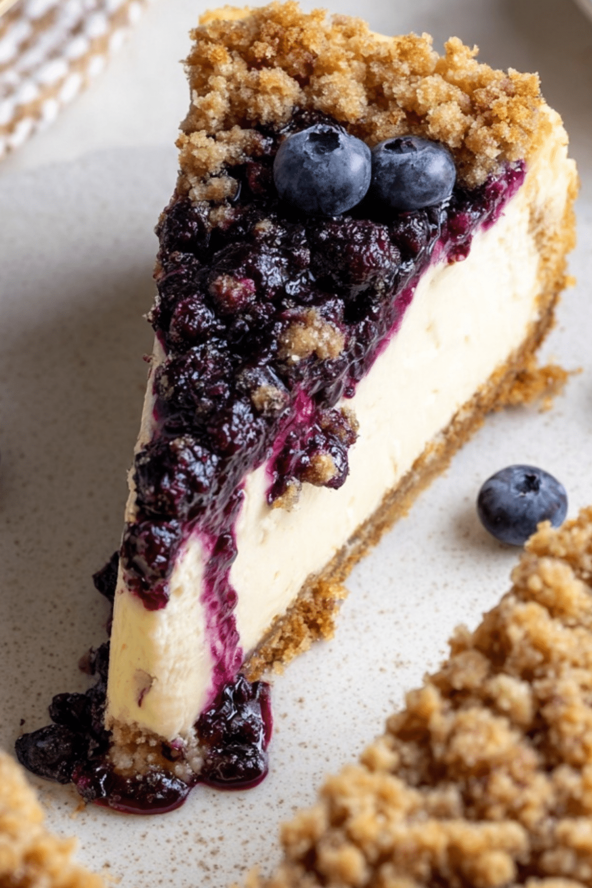Blueberry Crumble Cheesecake with creamy filling and crumble topping