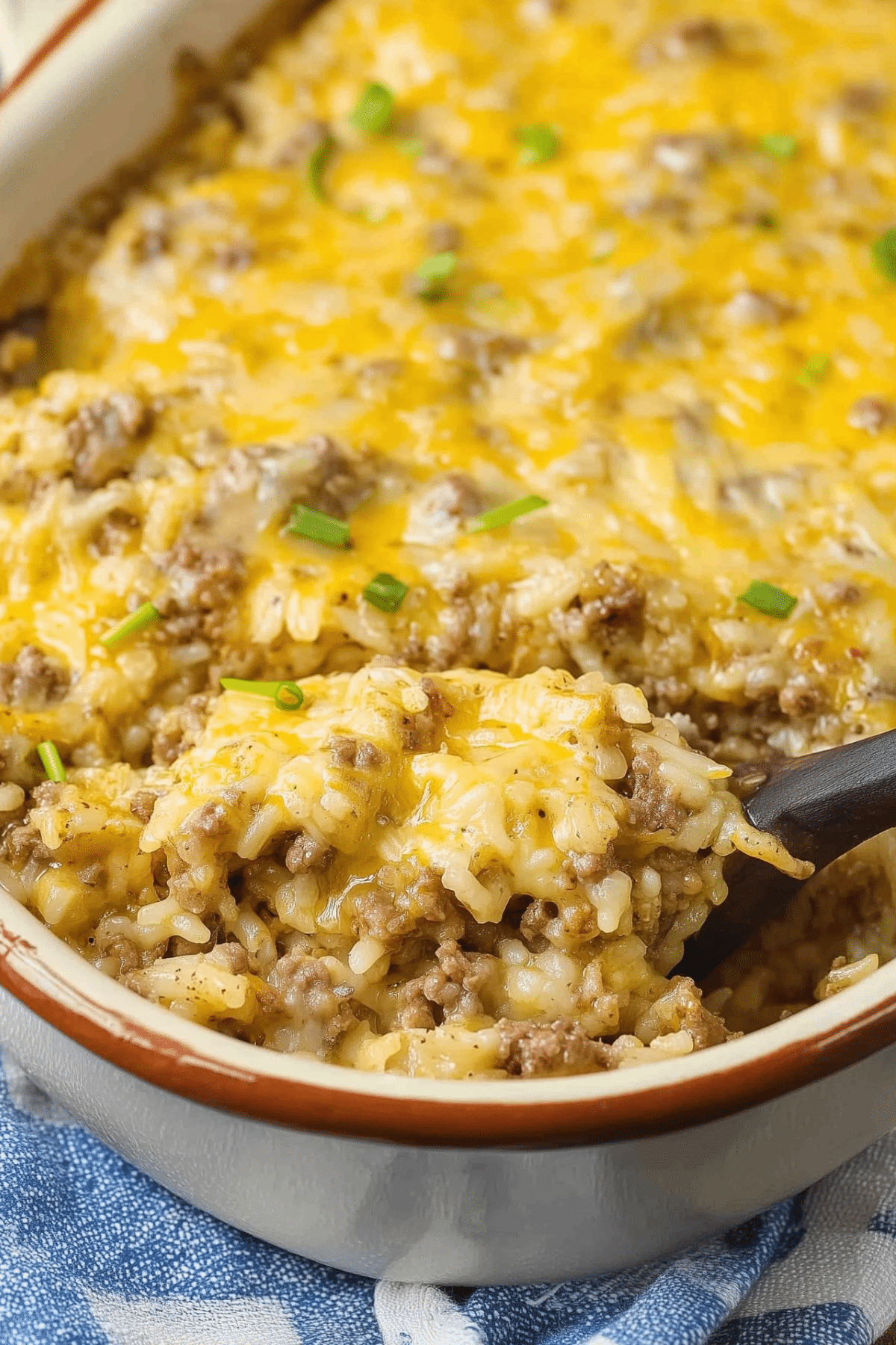 Cheesy Ground Beef and Rice Casserole baked with melted cheddar and creamy rice