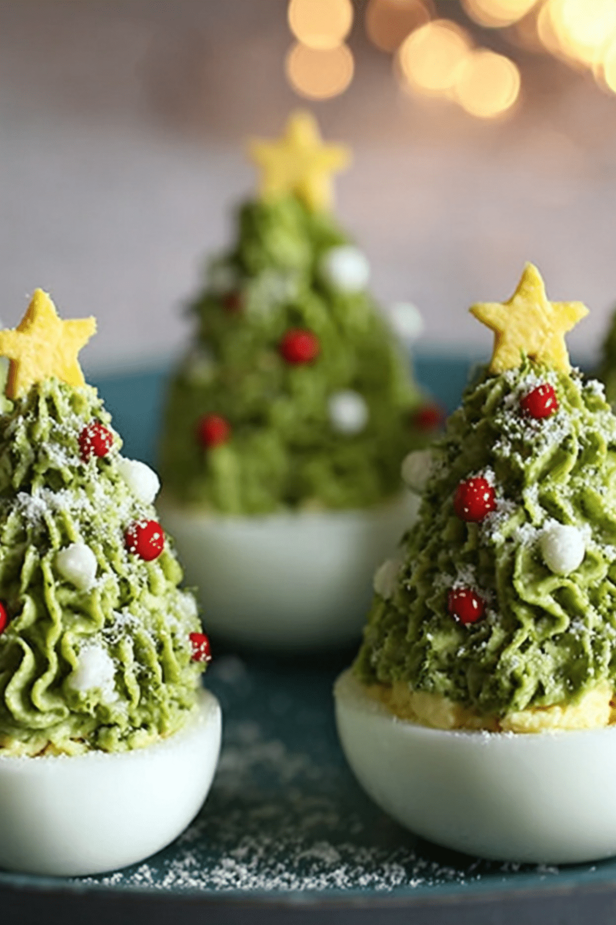 Deviled Egg Christmas Trees with vibrant green filling and festive decorations