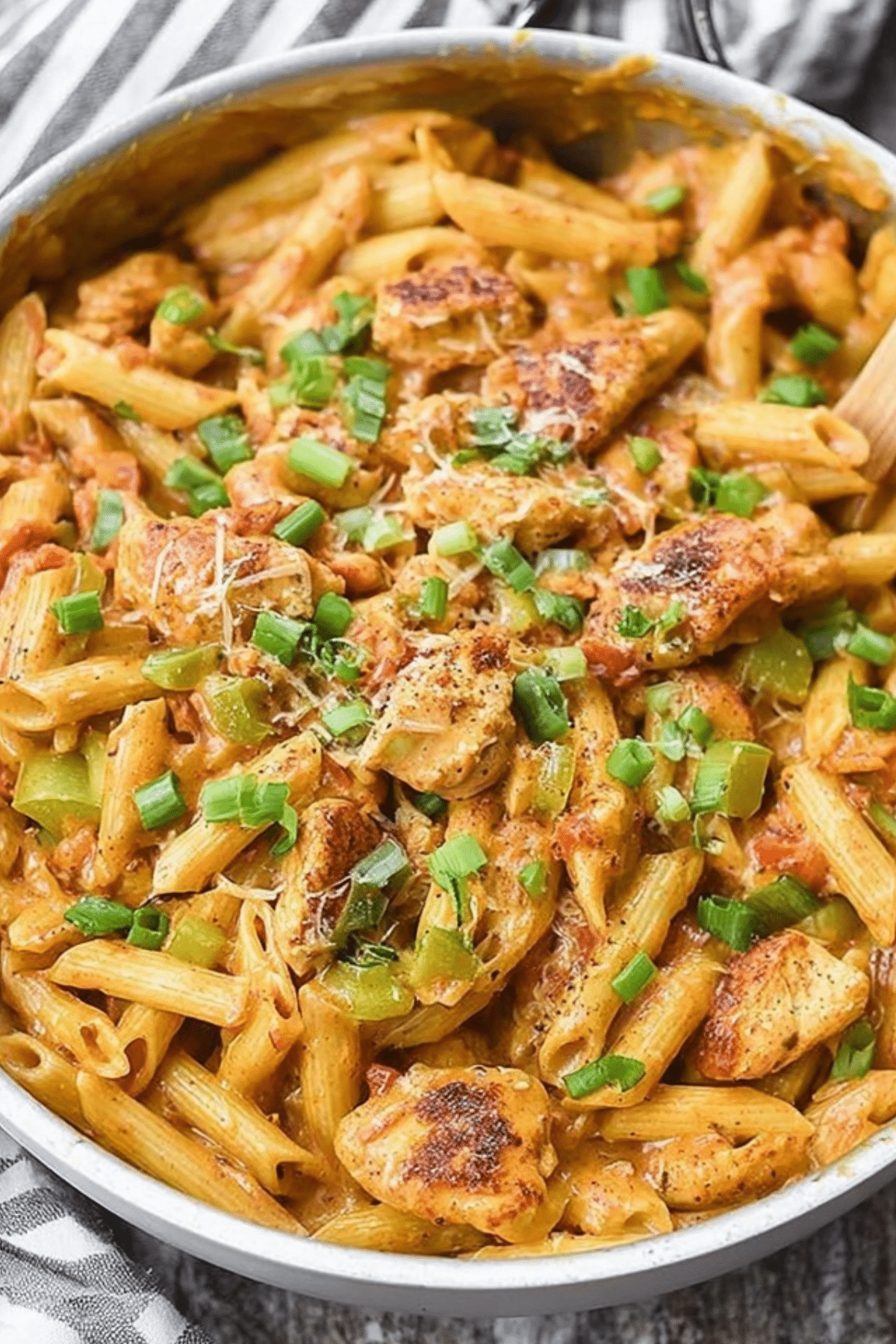 creamy one pot cajun chicken pasta in skillet