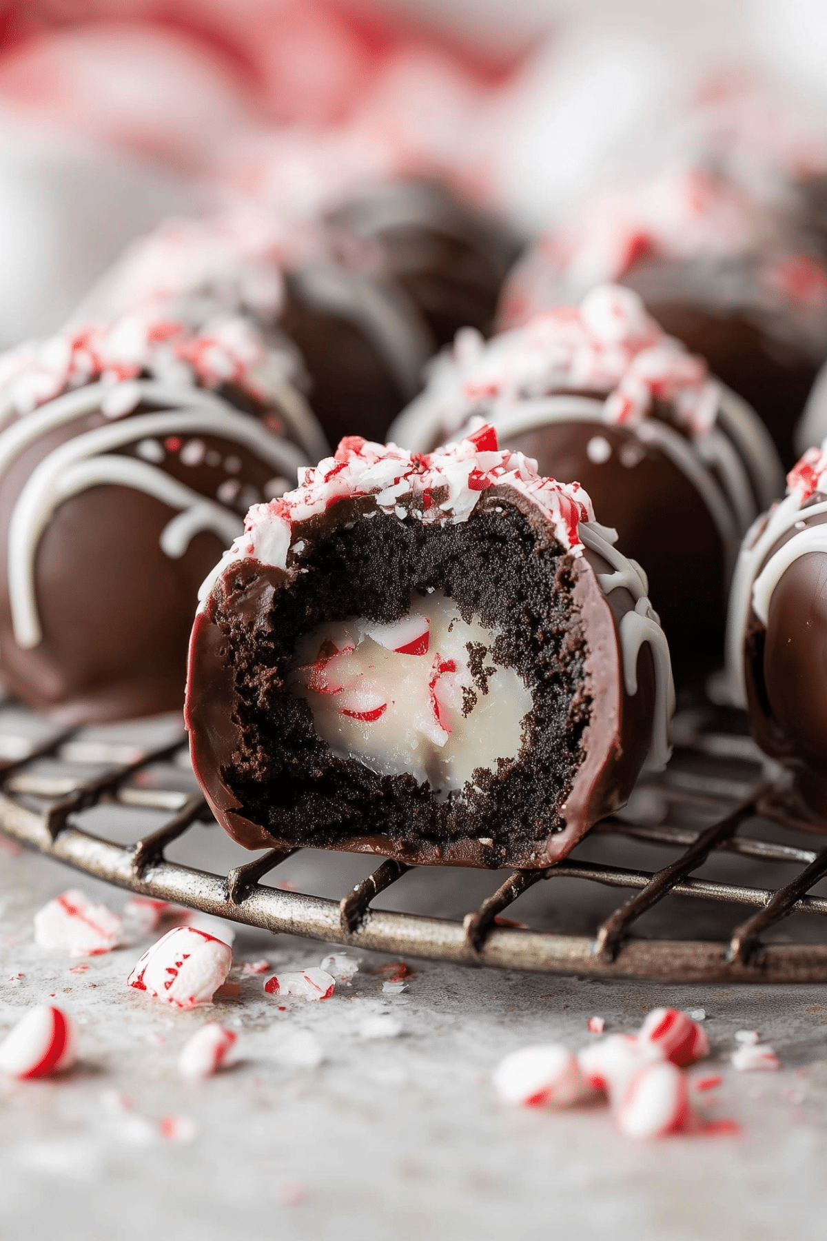Peppermint Oreo Truffle Balls dipped in chocolate and topped with crushed peppermint