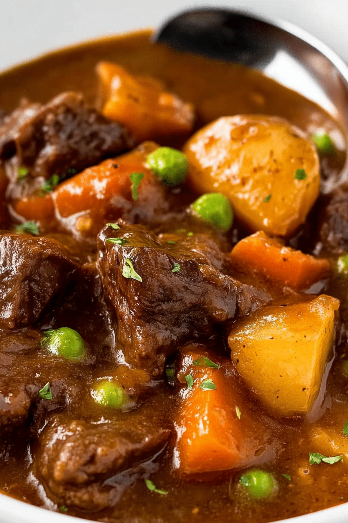 Slow Cooker Beef Stew with tender beef, potatoes, and carrots
