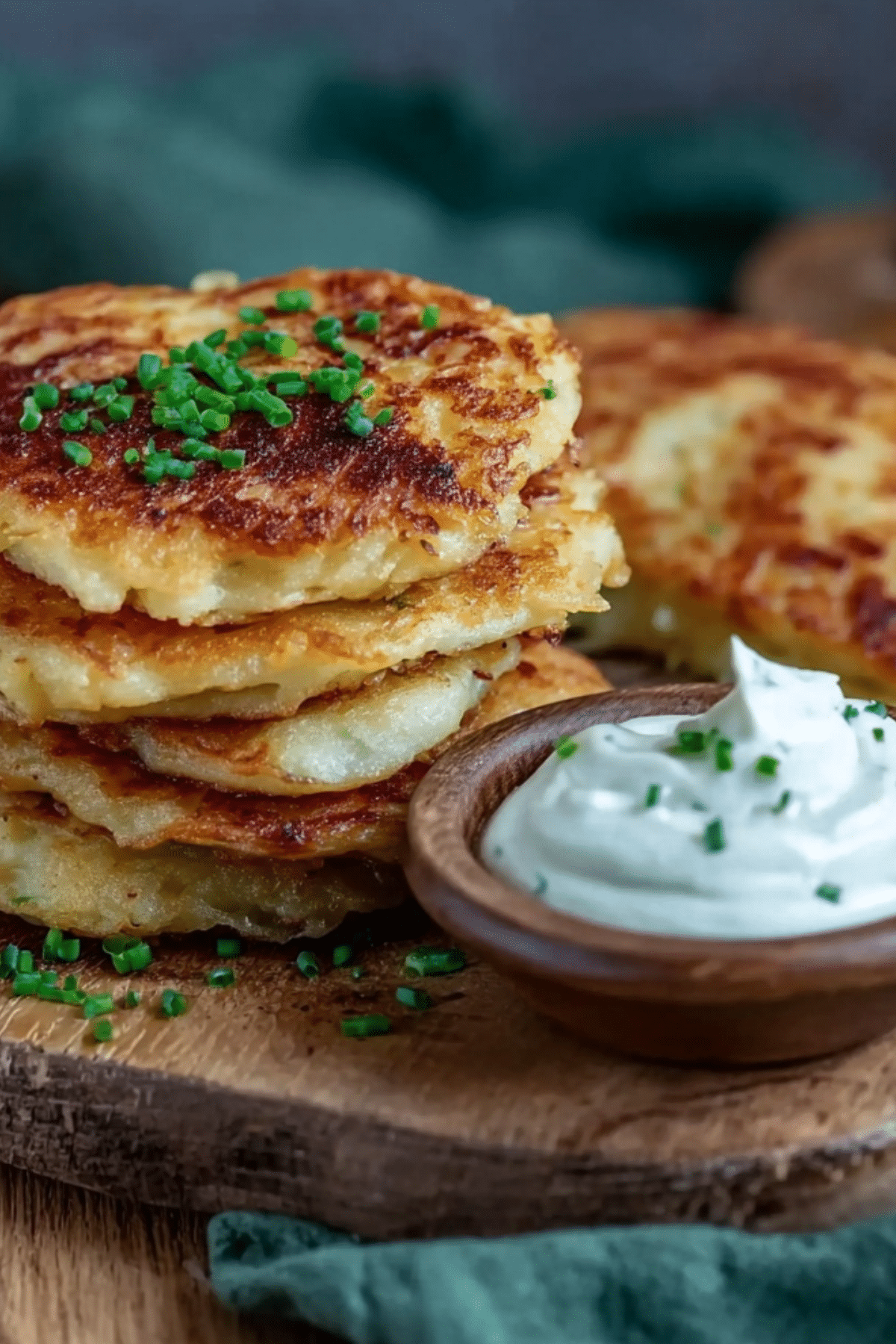 Golden crispy Cheddar Boxty served with sour cream and chives