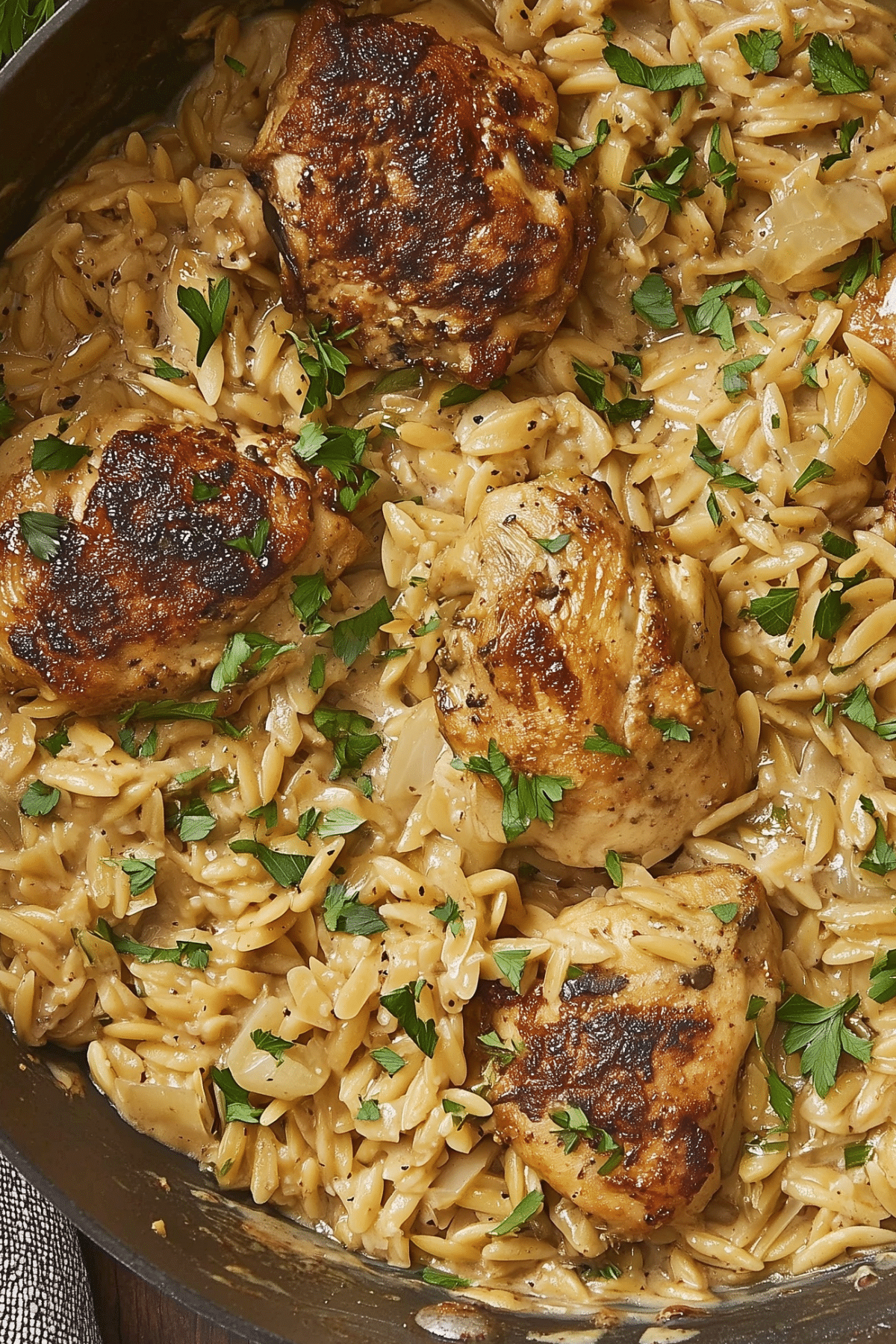 Creamy Chicken And Orzo Skillet with tender chicken and parmesan orzo