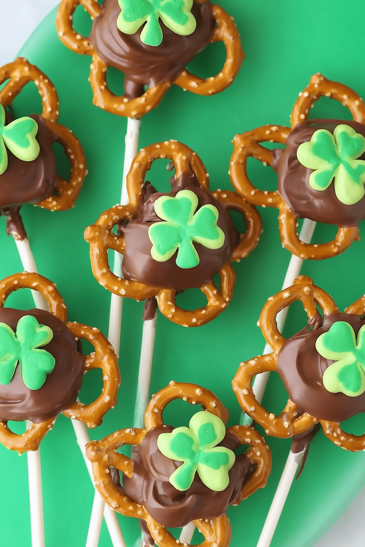 Shamrock Pretzel Pops - festive St. Patrick's Day treat with pretzels, caramel, and green candy