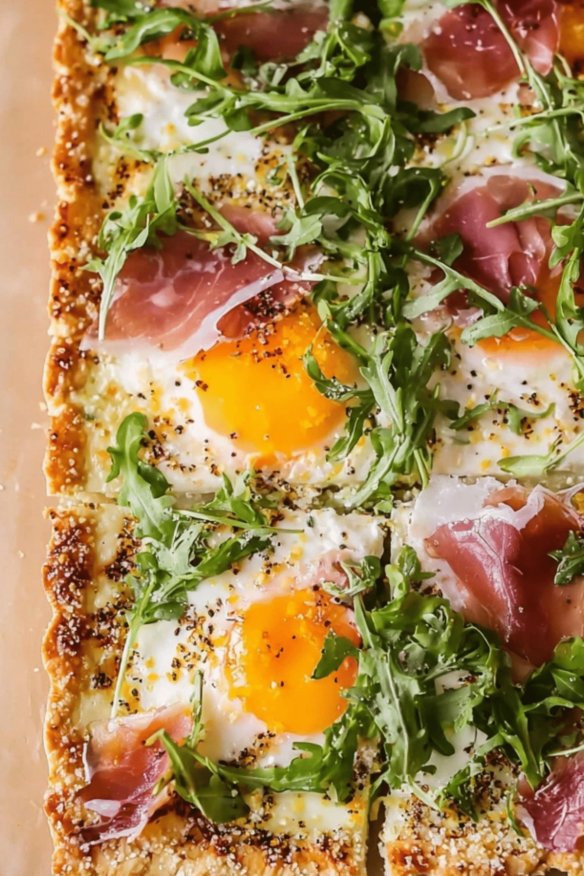Baked Prosciutto and Egg Breakfast Tart with flaky crust and eggs