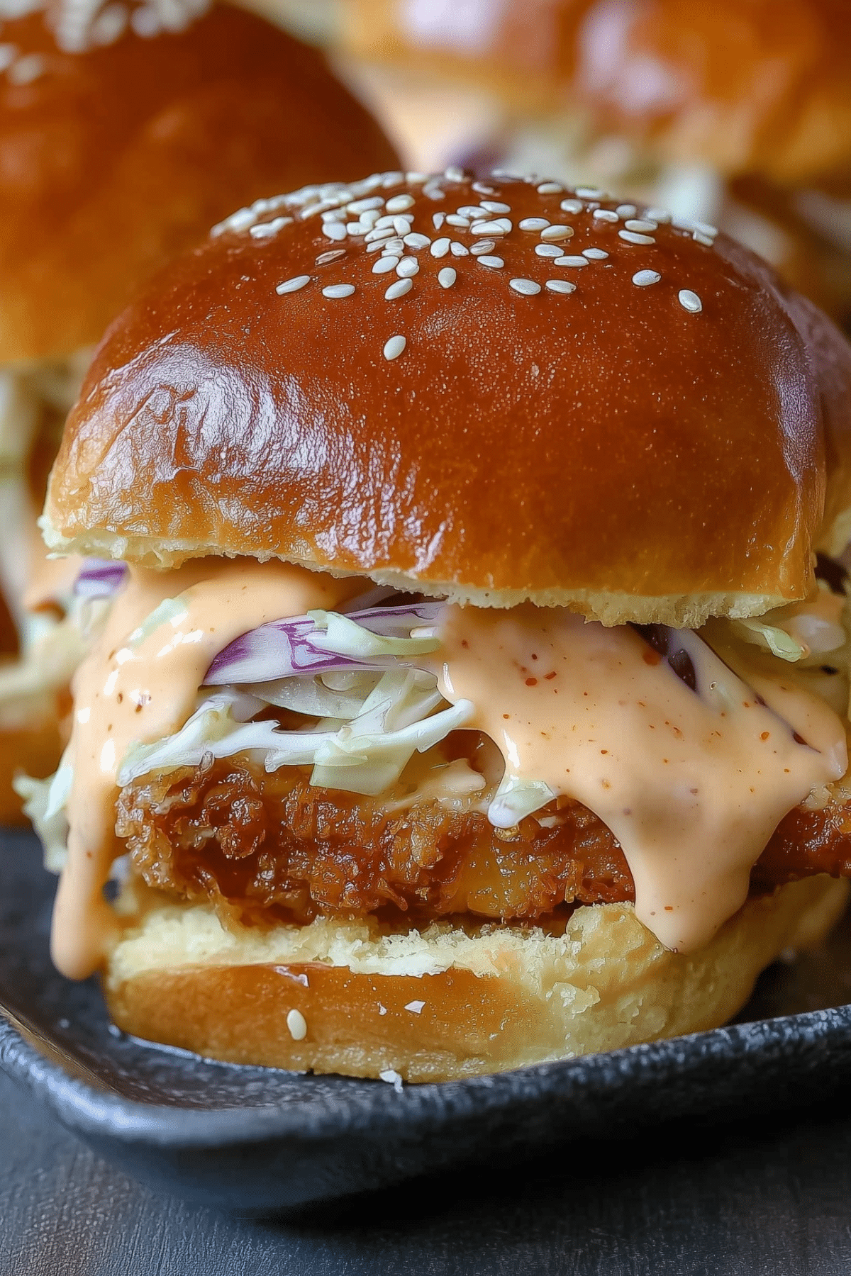 rispy Bang Bang Chicken Sliders with sauce