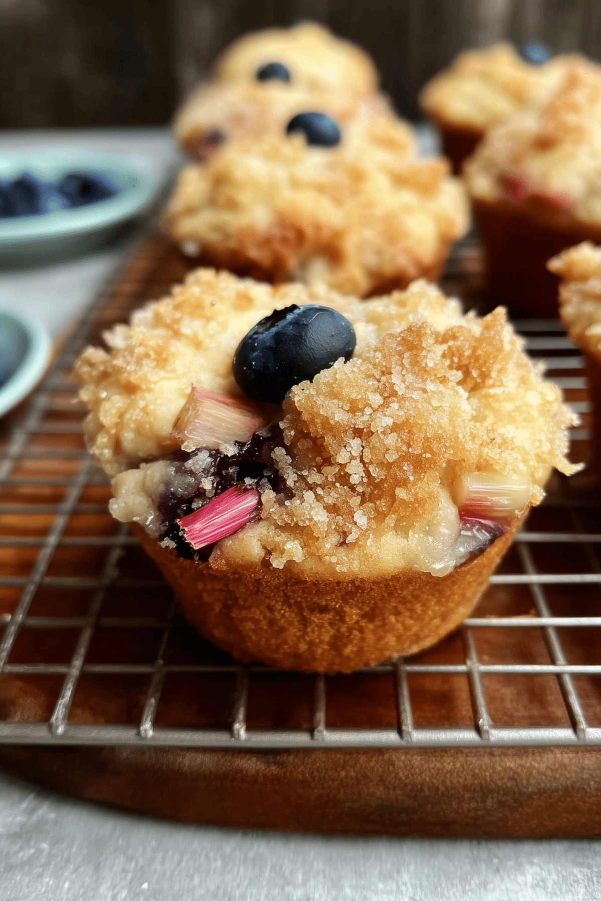 Blueberry Rhubarb Muffins on a cooling rack
