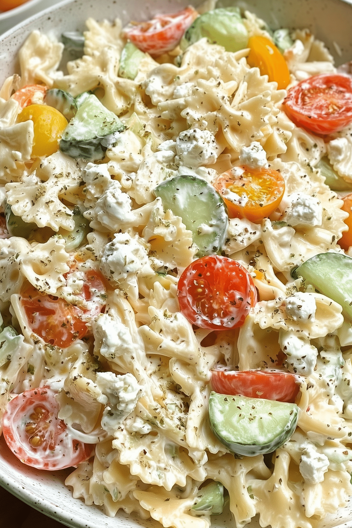 Cottage cheese pasta salad with fresh vegetables and creamy dressing