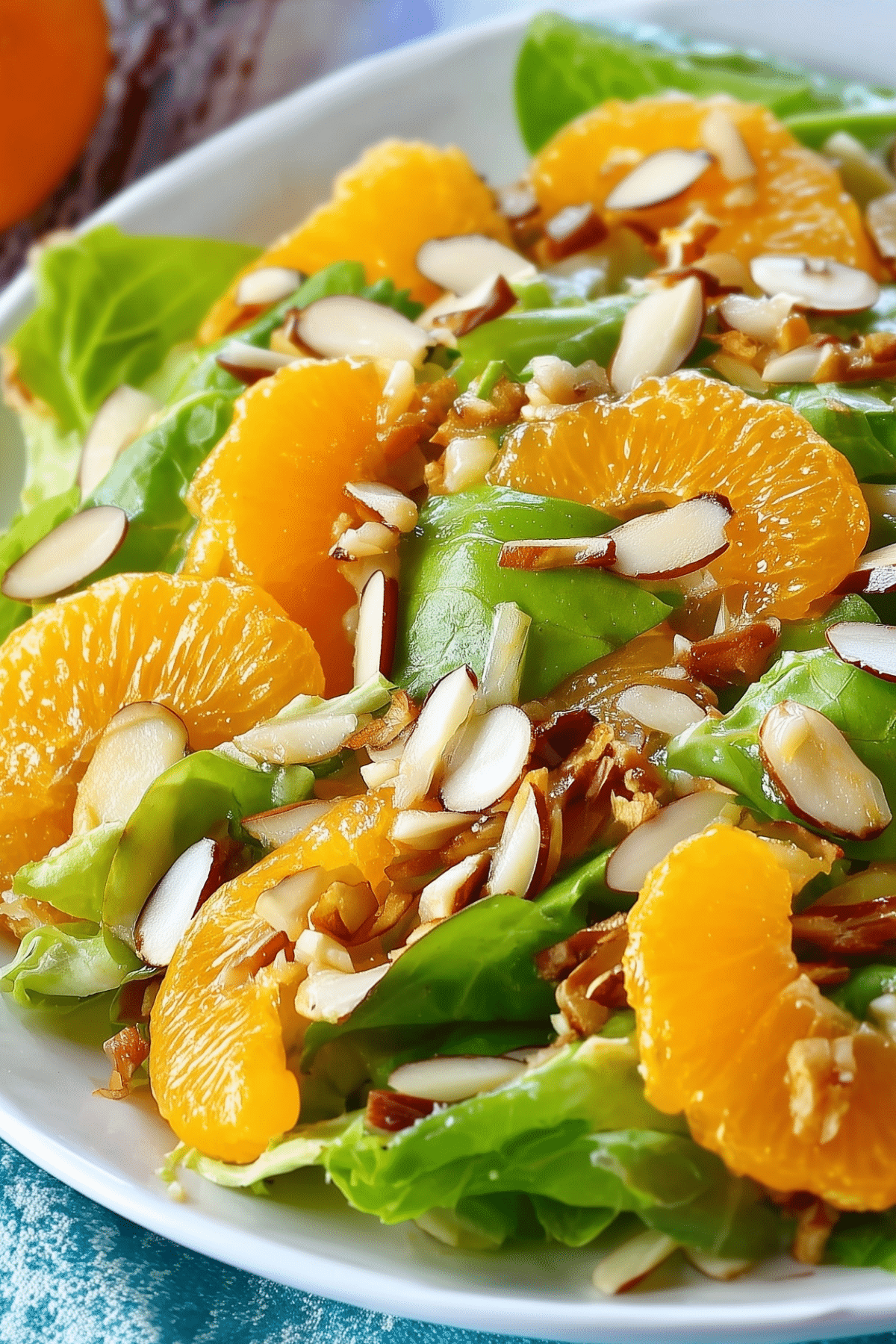 Delicious Mandarin Orange Almond Salad with crispy almonds and juicy mandarin segments
