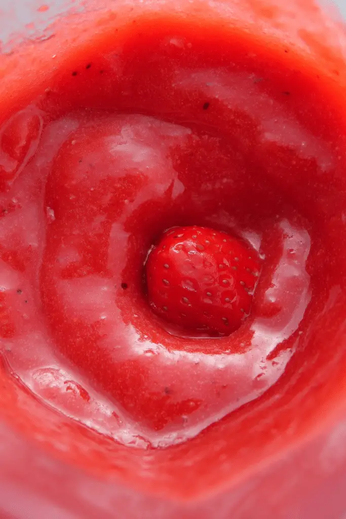 Strawberry Daiquiri cocktail with fresh strawberries and lime