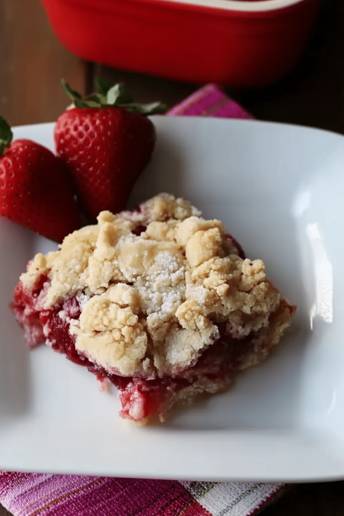 Strawberry Dump Cake served in a baking dish