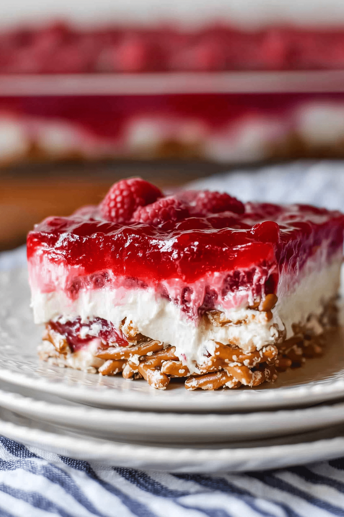 Raspberry Pretzel Salad dessert with fresh raspberries