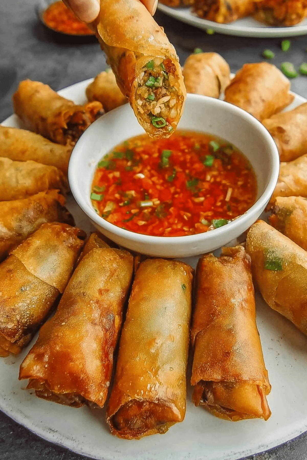 Vegan Lumpiang Shanghai crispy golden spring rolls served with dipping sauce