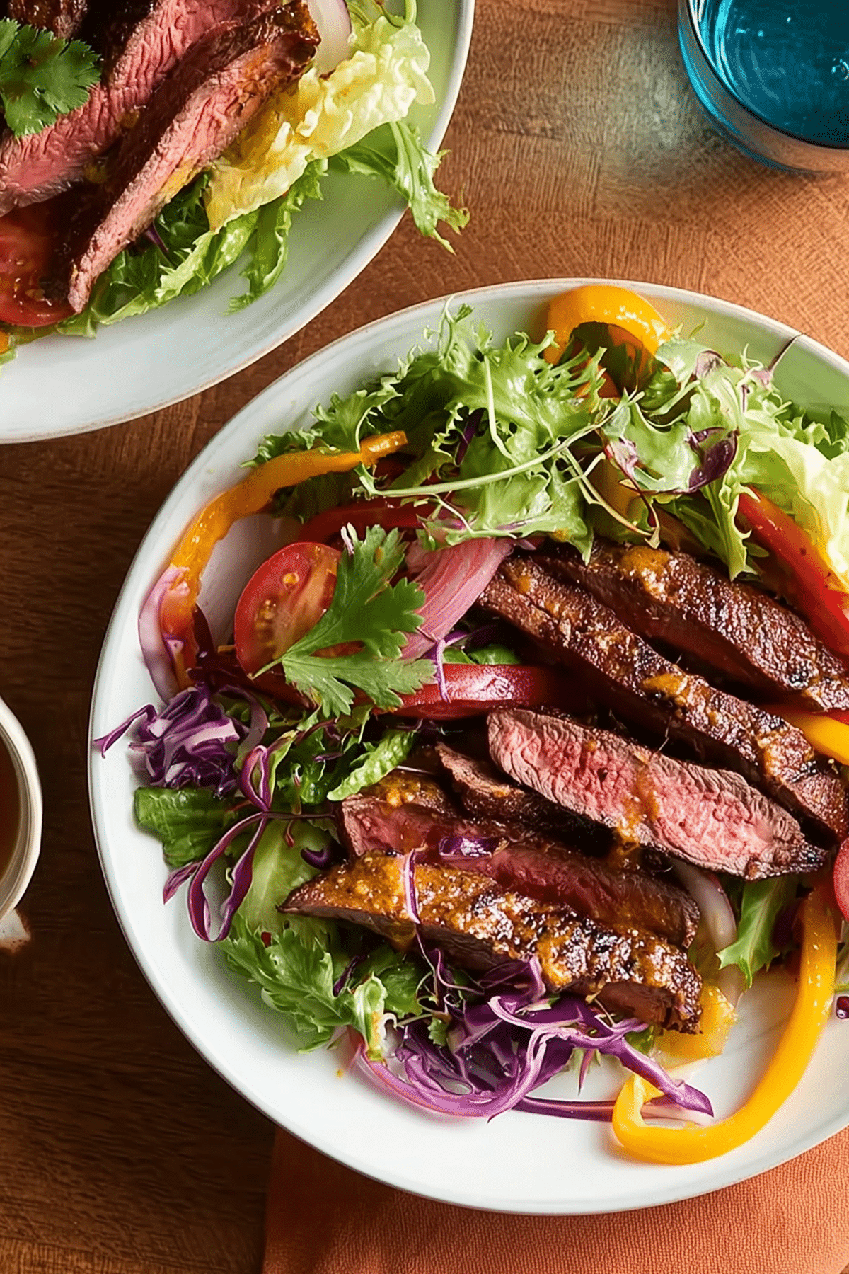 Warm Fajita Steak Salad with grilled steak and peppers