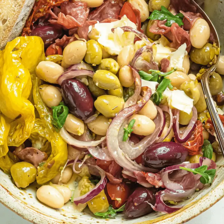: White bean antipasto salad with olives, sun-dried tomatoes, and fresh herbs
