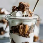 Chocolate Babka Parfaits layered with whipped cream and chocolate shavings