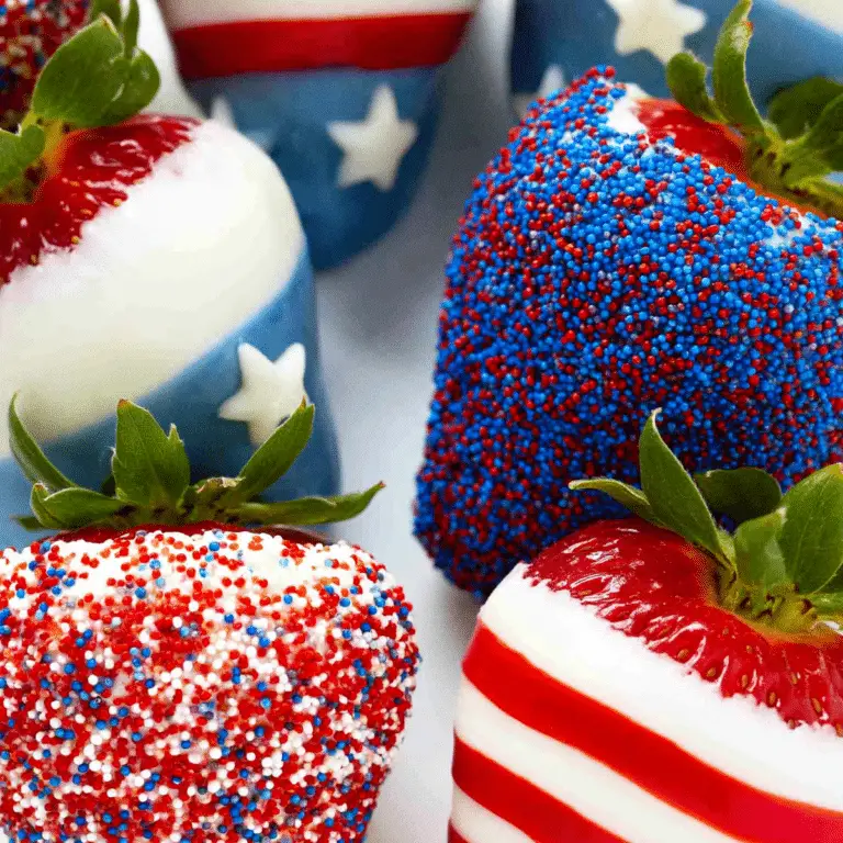 Patriotic Chocolate Covered Strawberries decorated with red white and blue sprinkles