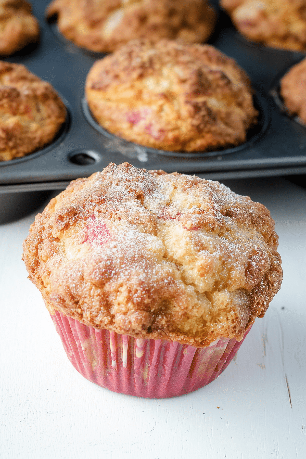 Freshly baked rhubarb muffins with Greek yogurt on a plate