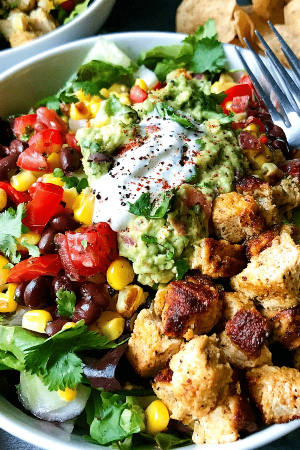 Santa Fe Salad with grilled chicken, avocado, corn, and black beans