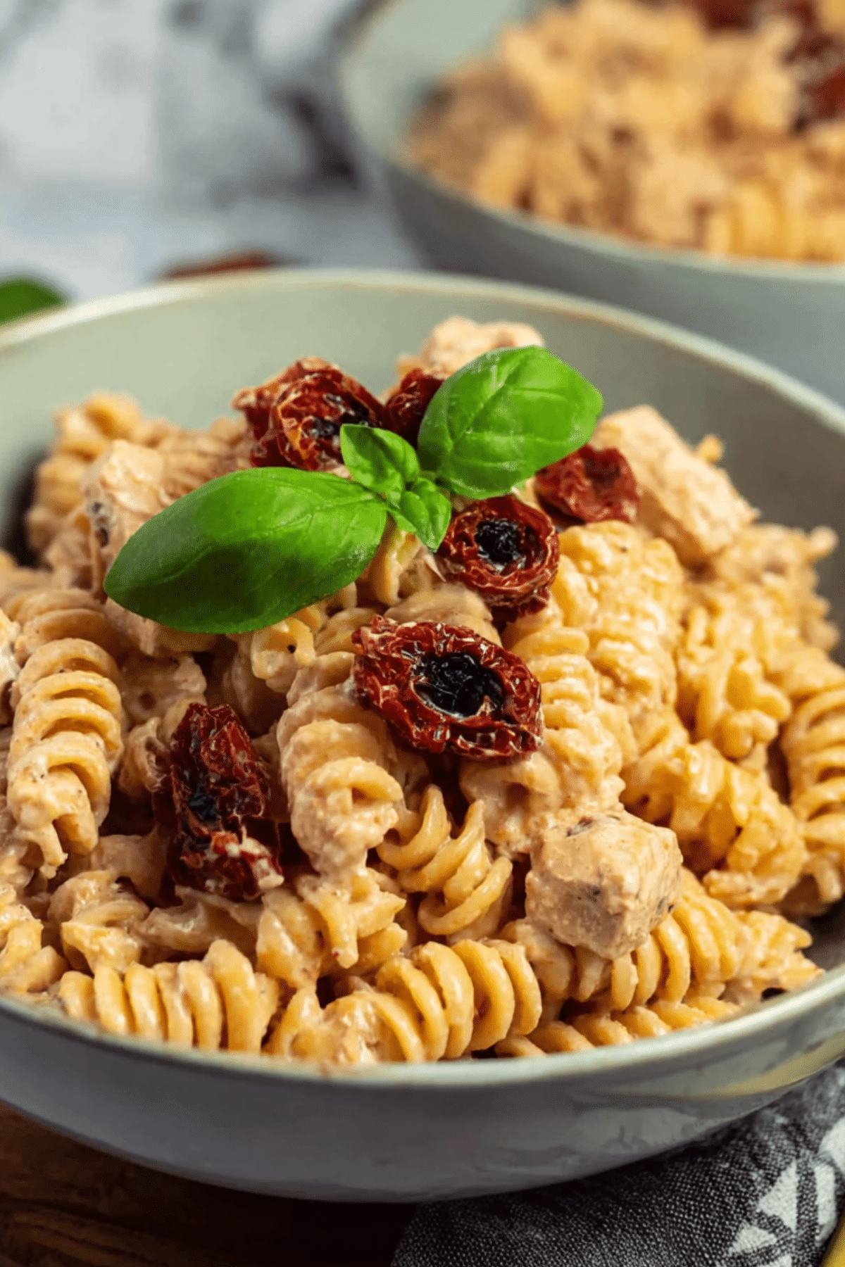 Creamy Tofu Pasta with Sundried Tomatoes served on a plate